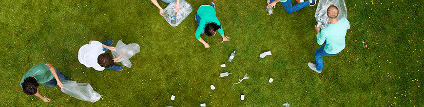 Aerial view of people picking up litter outdoors