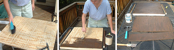 With a soft brush, sawdust is swept off slabs of plywood. Each piece is then hand painted with a dark walnut brown stain.